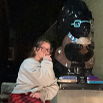 me and a squirrel statue in Marysville, KS
